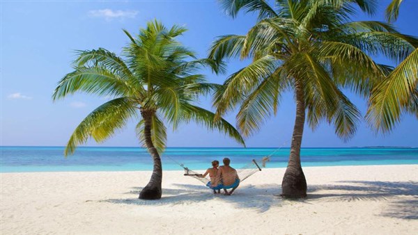 Kuredu Island Resort houpačka mezi palmami | Kuredu Island Resort