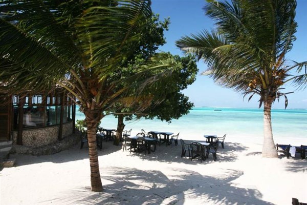 Karafuu Beach Resort & Spa posezení na pláži u moře | Karafuu Beach Resort & Spa